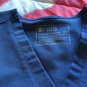 Figs uniform. Top size XXS, Pants size XS petite, color navy blues.